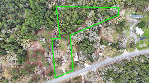 1.66 Acres of Land with Home for Sale in Freeport, Florida