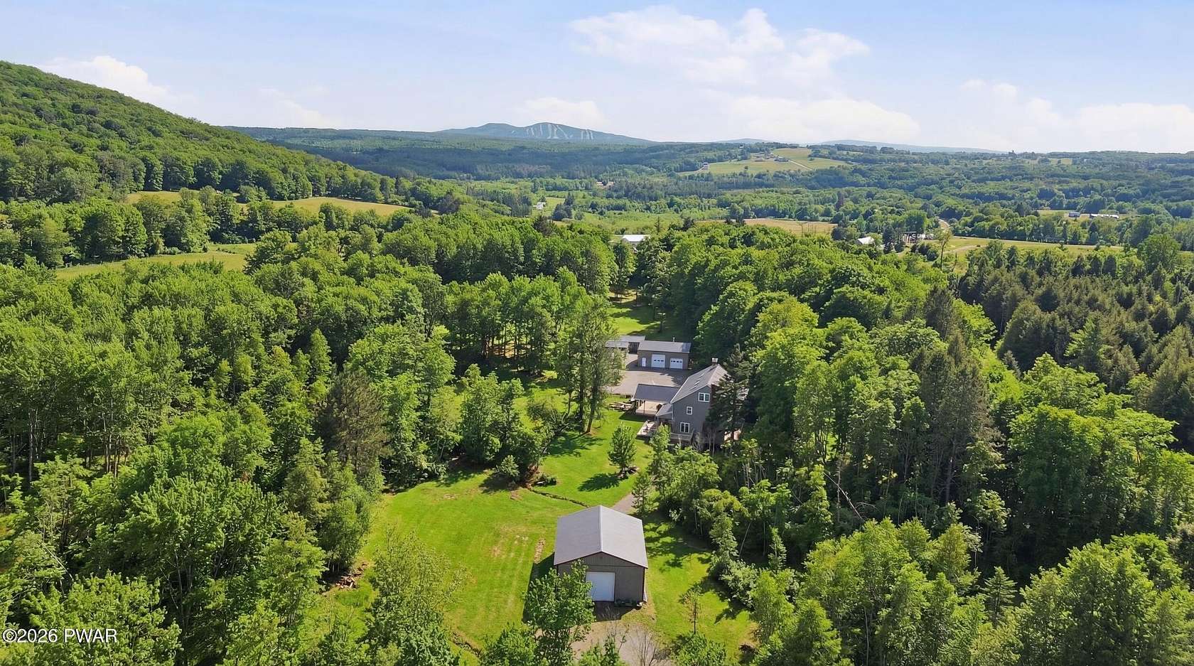 20 Acres of Recreational Land with Home for Sale in Union Dale, Pennsylvania