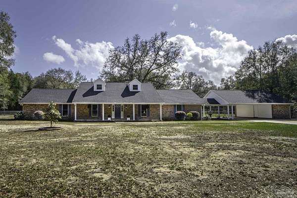 4.3 Acres of Land with Home for Sale in Milton, Florida