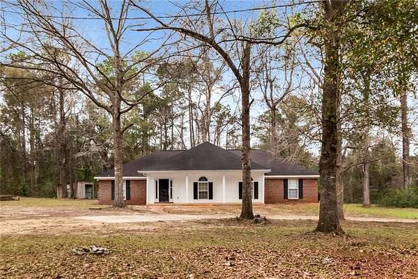 3 Acres of Land with Home for Sale in Chunchula, Alabama