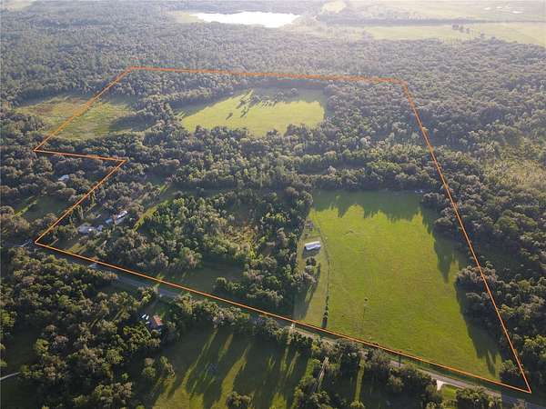 142 Acres of Land with Home for Sale in Micanopy, Florida