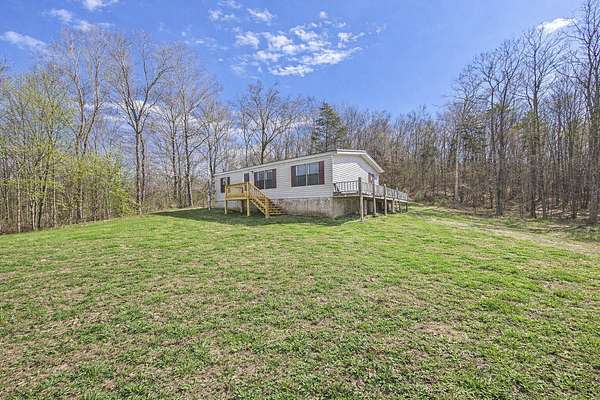 22.5 Acres of Agricultural Land with Home for Sale in Englewood, Tennessee