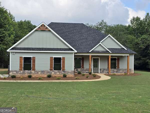 4.7 Acres of Land with Home for Sale in Waco, Georgia