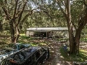 5.53 Acres of Land with Home for Sale in Sumterville, Florida