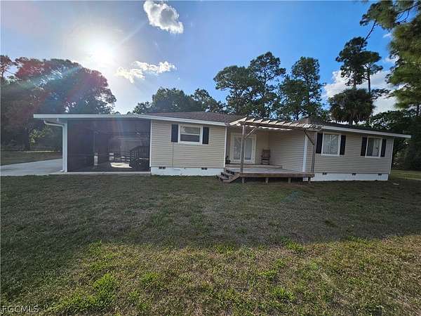 1.5 Acres of Land with Home for Sale in Lehigh Acres, Florida