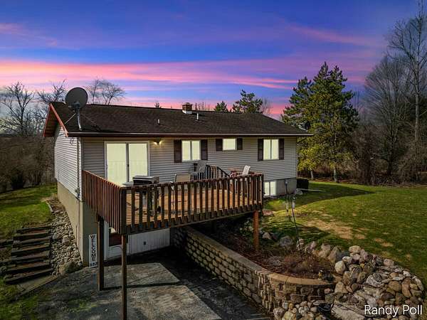 5 Acres of Land with Home for Sale in Sand Lake, Michigan