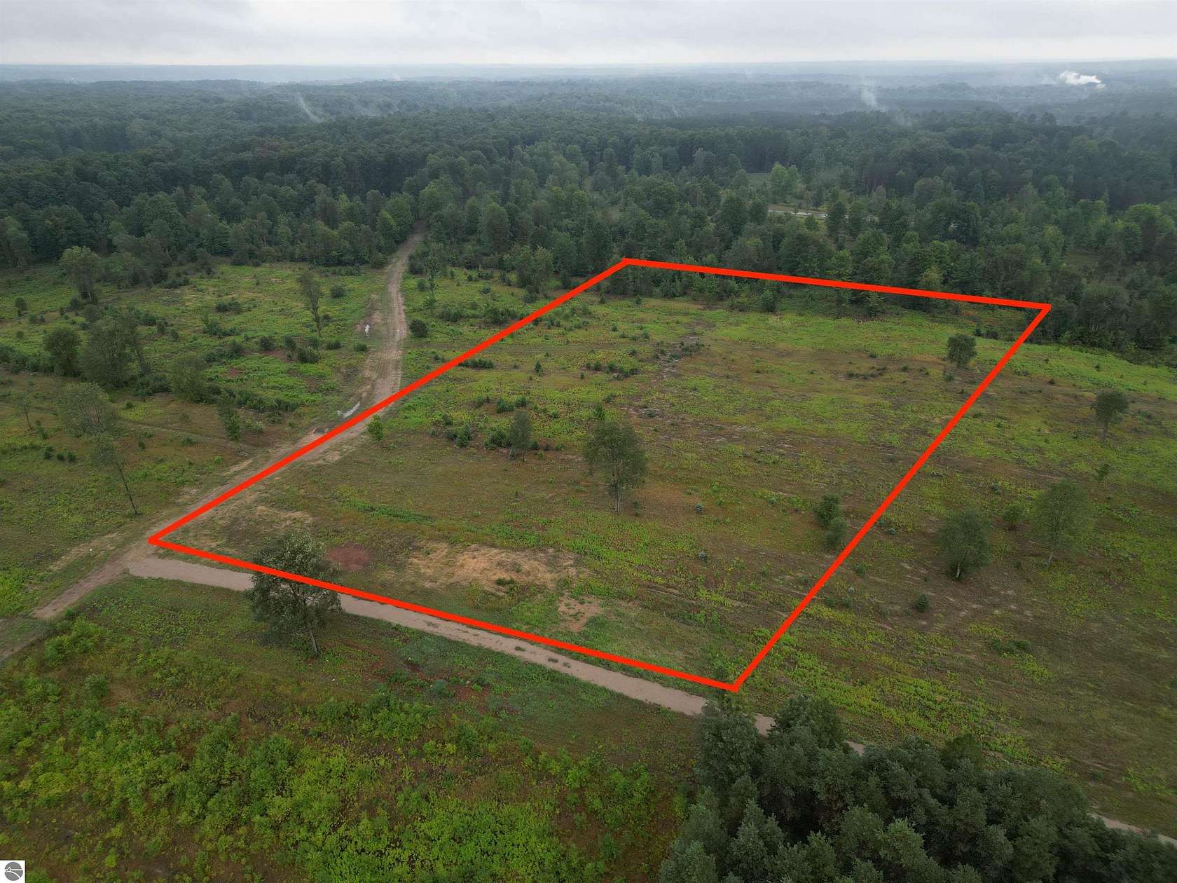 5 Acres of Residential Land for Sale in Maple City, Michigan