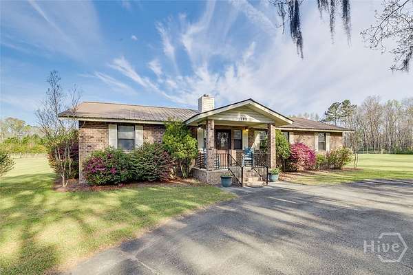 6.79 Acres of Land with Home for Sale in Guyton, Georgia