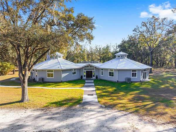10.7 Acres of Land with Home for Sale in Alachua, Florida