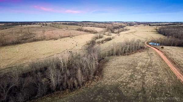 895 Acres of Agricultural Land with Home for Sale in Stella, Missouri