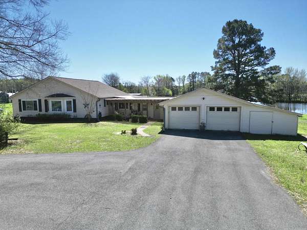 11.3 Acres of Recreational Land with Home for Sale in Wilmar, Arkansas