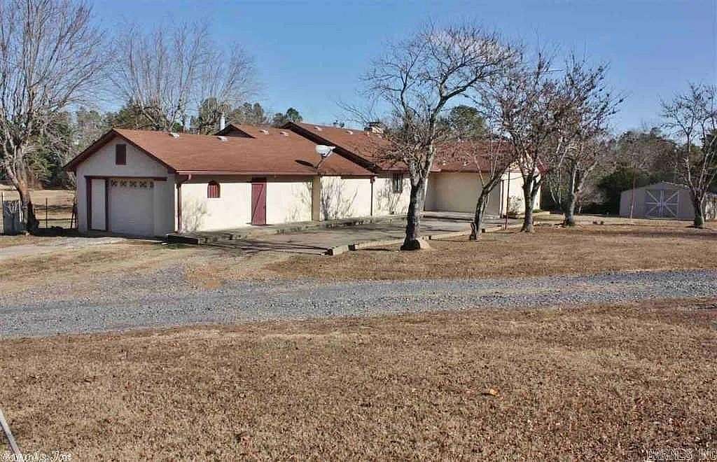 5.45 Acres of Land with Home for Sale in Mena, Arkansas