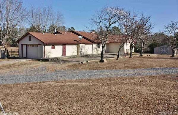 5.45 Acres of Land with Home for Sale in Mena, Arkansas