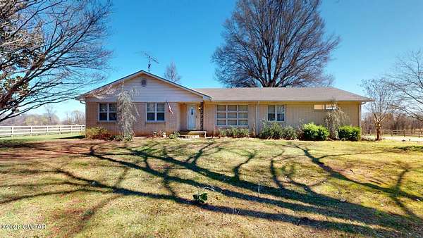 29.4 Acres of Agricultural Land with Home for Sale in Newbern, Tennessee