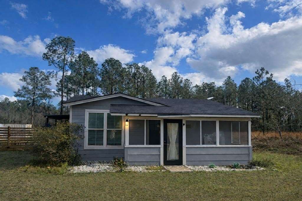 4.4 Acres of Land with Home for Sale in Naylor, Georgia