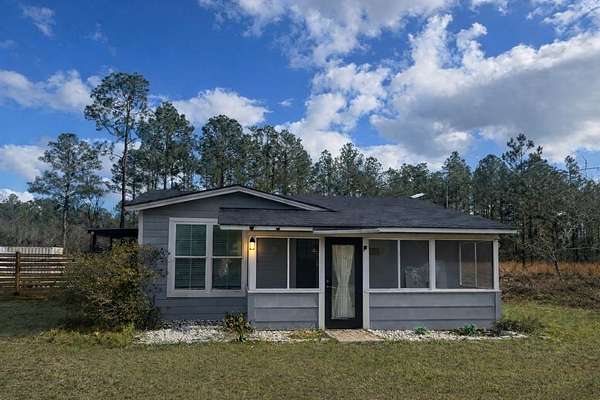 4.4 Acres of Land with Home for Sale in Naylor, Georgia