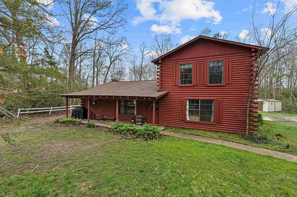 4.76 Acres of Land with Home for Sale in Carthage, Texas