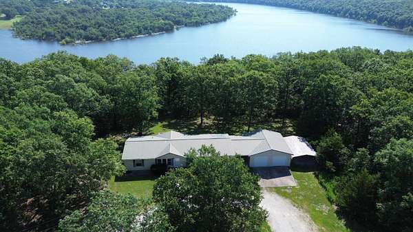 24.5 Acres of Recreational Land with Home for Sale in Pittsburg, Missouri