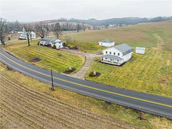 6.3 Acres of Land with Home for Auction in New Philadelphia, Ohio