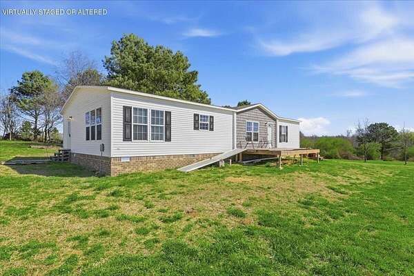 7.9 Acres of Land with Home for Sale in Pisgah, Alabama