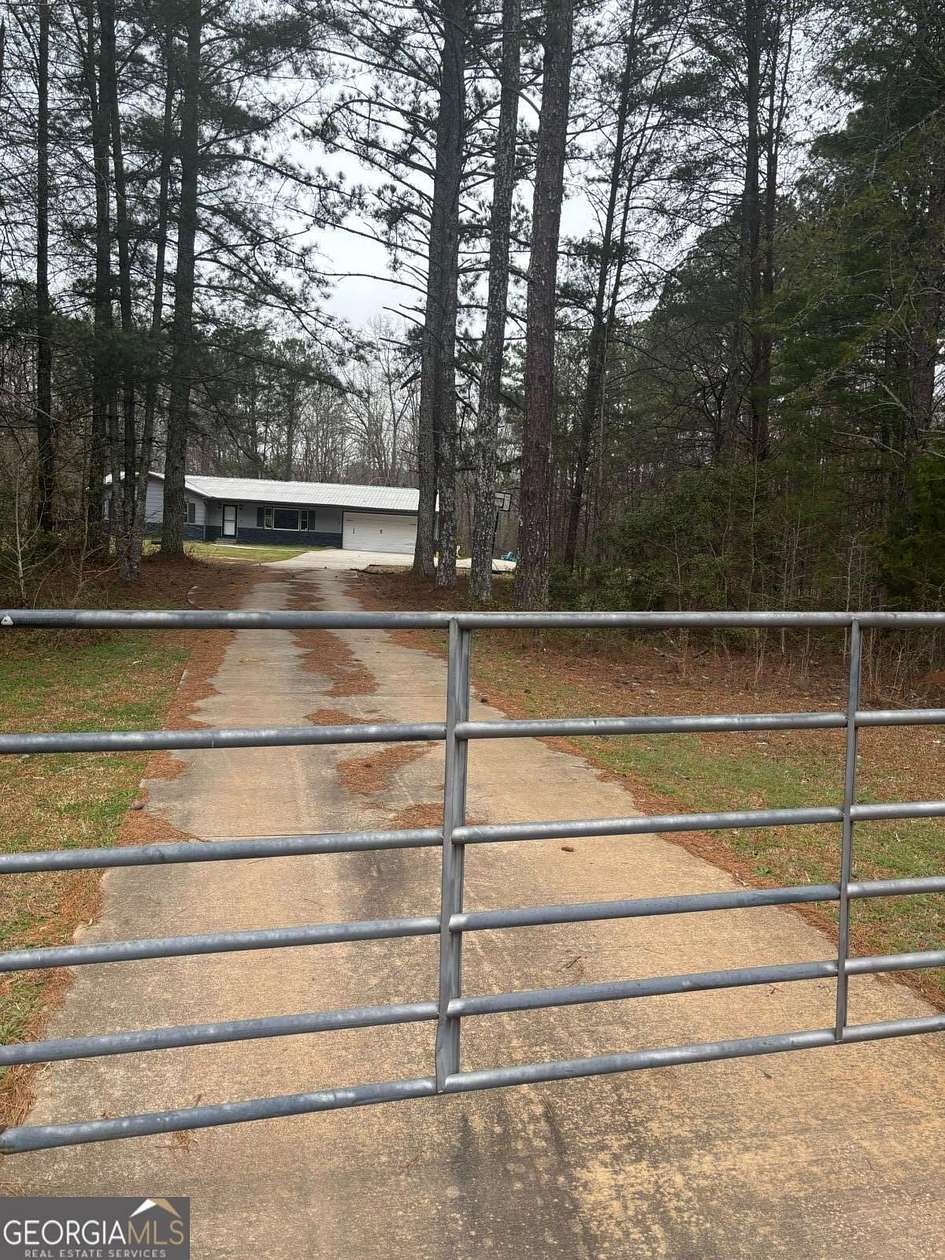 3.72 Acres of Land with Home for Sale in McDonough, Georgia