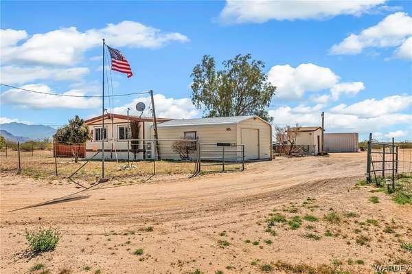 2.66 Acres of Land with Home for Sale in Golden Valley, Arizona
