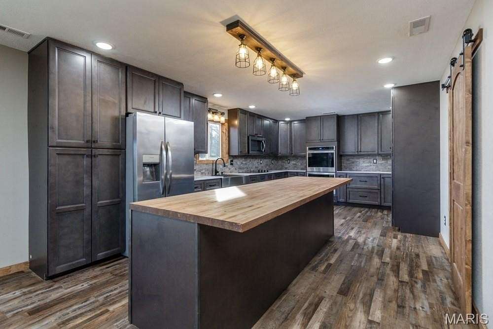 4.63 Acres of Land with Home for Sale in Lebanon, Missouri