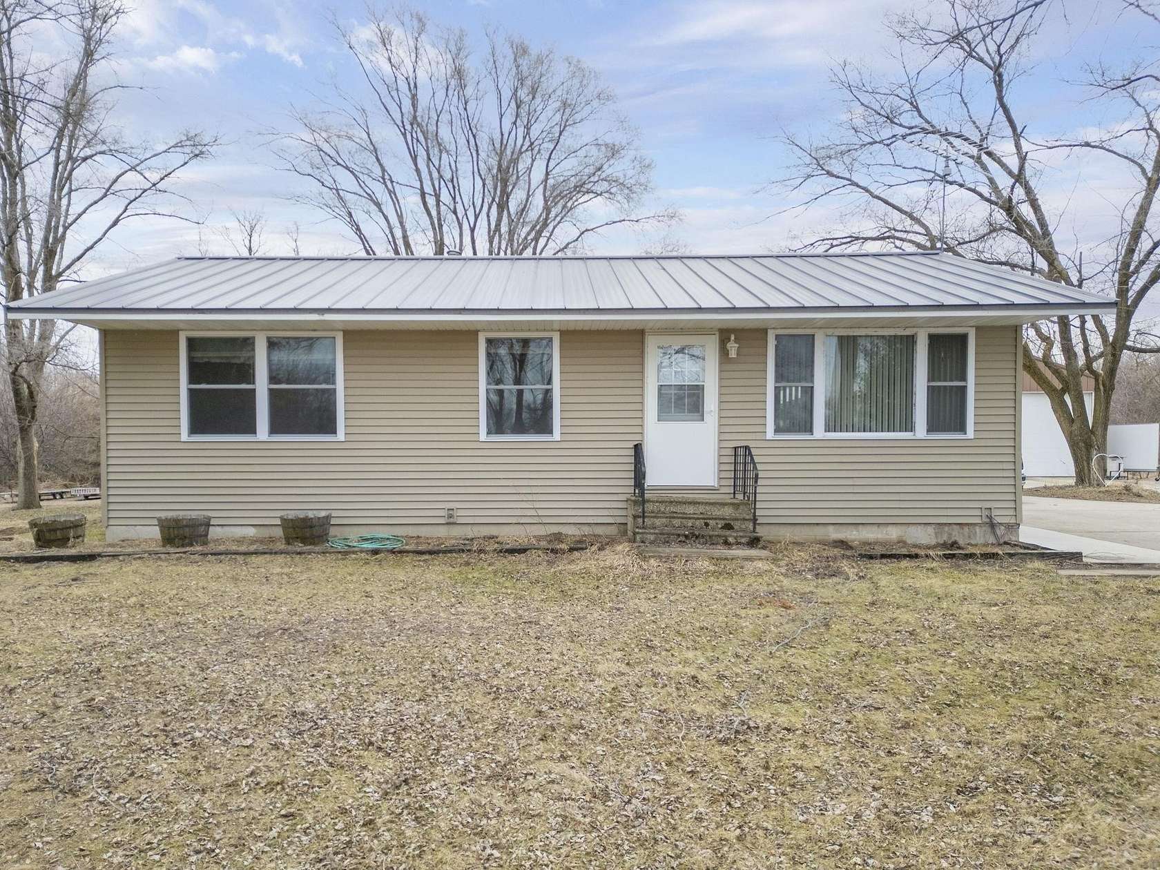 3 Acres of Land with Home for Sale in Cedar Falls, Iowa