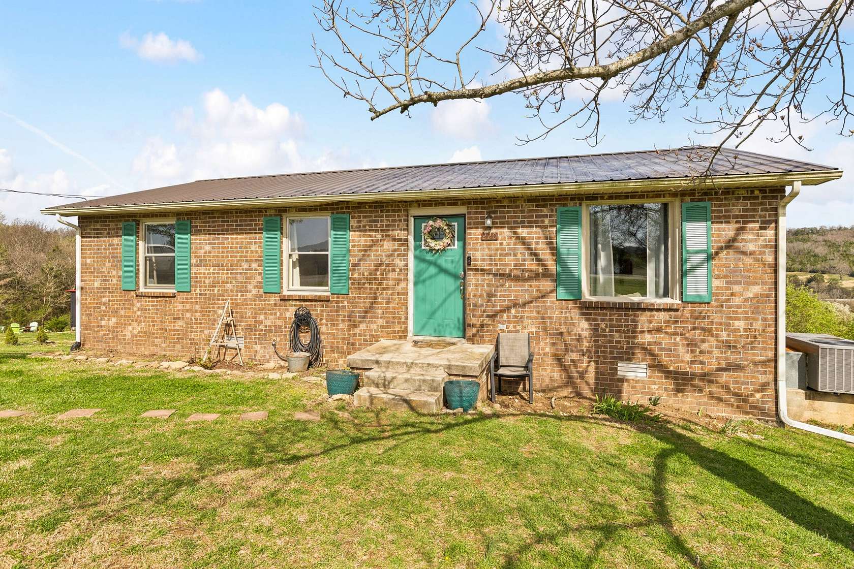 1.68 Acres of Land with Home for Sale in Auburntown, Tennessee