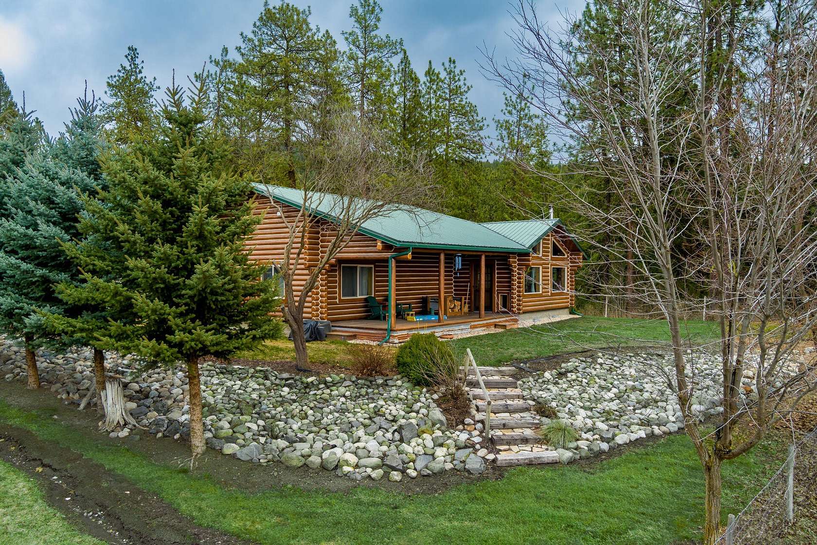 20.1 Acres of Recreational Land with Home for Sale in Evans, Washington
