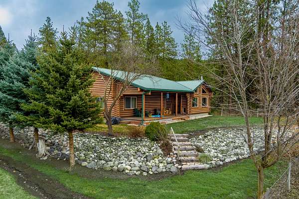 20.1 Acres of Recreational Land with Home for Sale in Evans, Washington