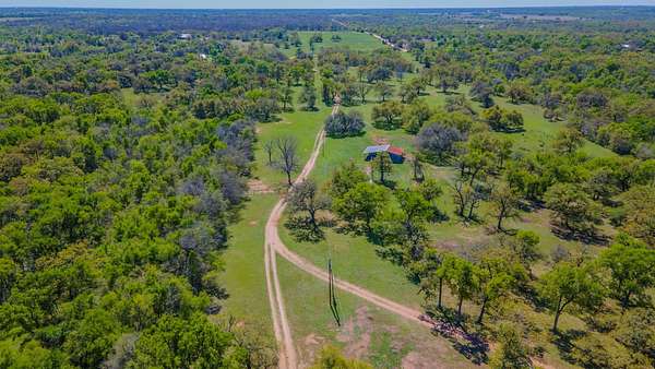 80.4 Acres of Land with Home for Sale in Buckholts, Texas