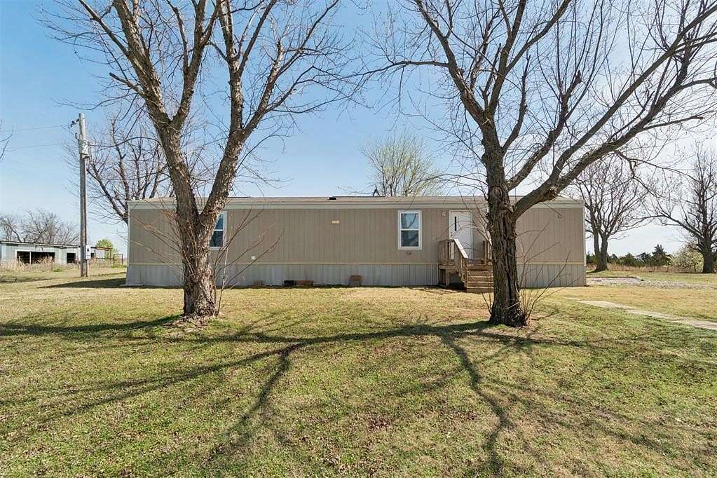 5 Acres of Land with Home for Sale in Cashion, Oklahoma