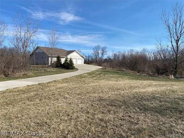 6.65 Acres of Land with Home for Sale in Dover Township, Michigan