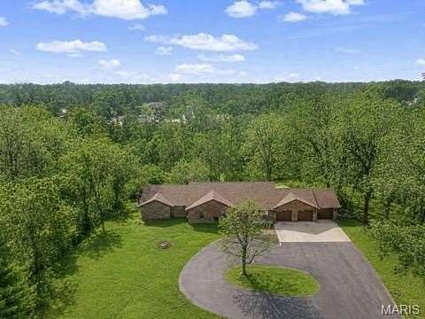 5.7 Acres of Land with Home for Sale in O'Fallon, Illinois
