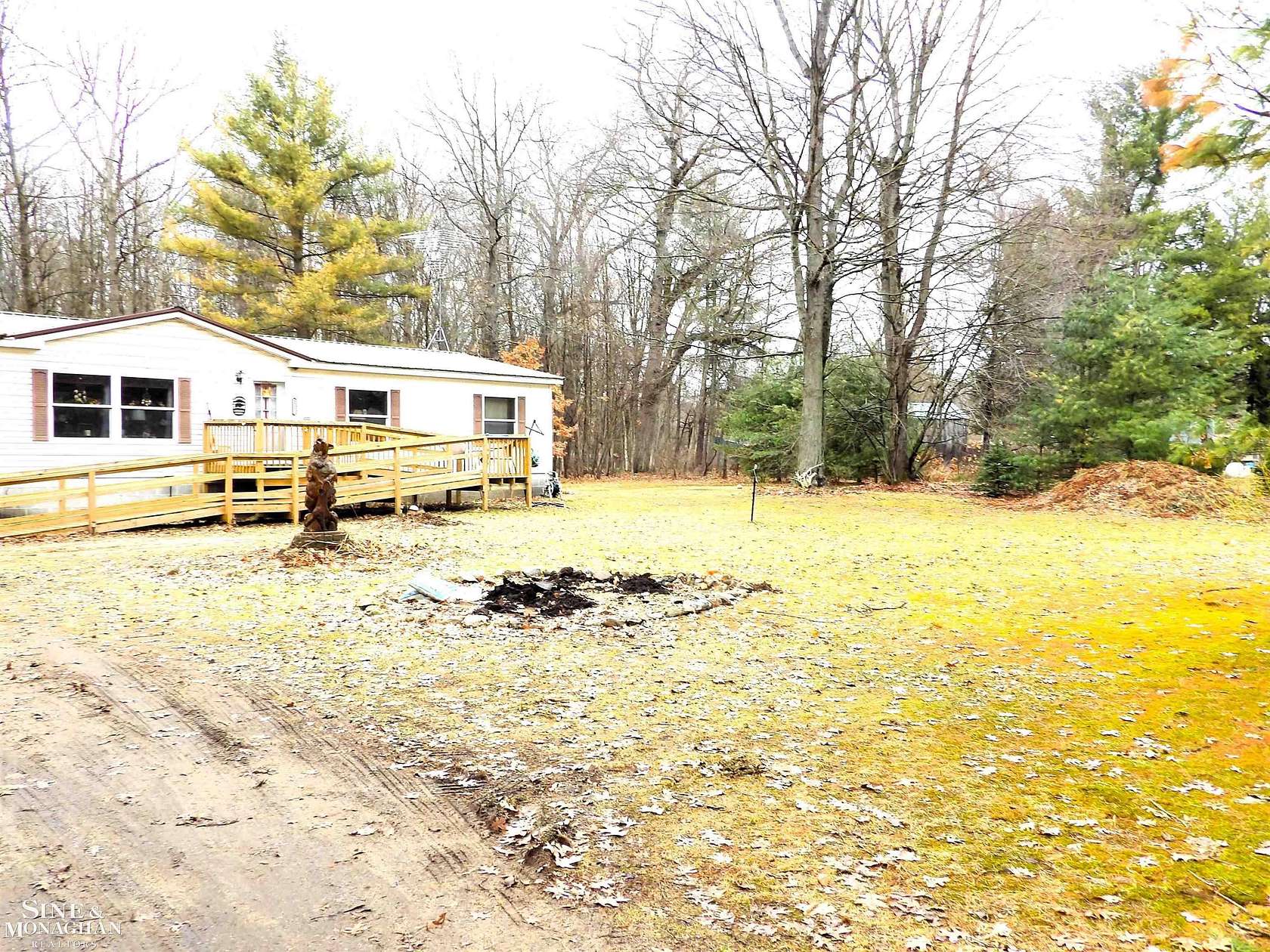 2.5 Acres of Land with Home for Sale in White Cloud, Michigan