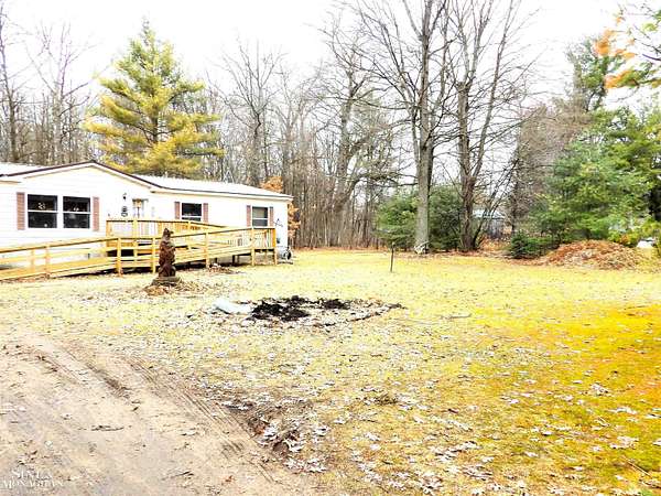 2.5 Acres of Land with Home for Sale in White Cloud, Michigan