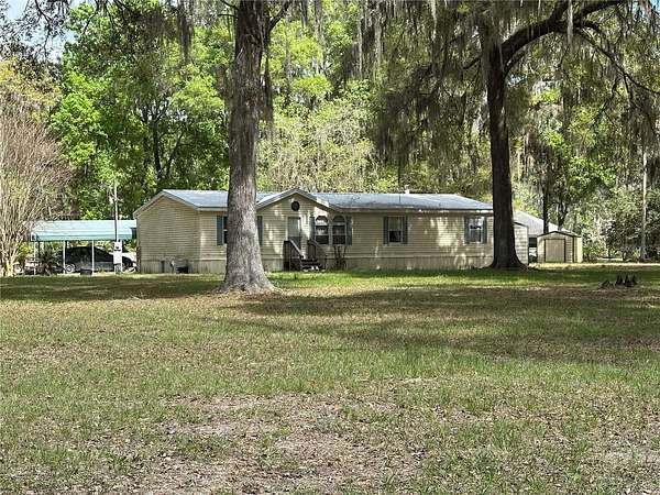 3 Acres of Land with Home for Sale in Citra, Florida