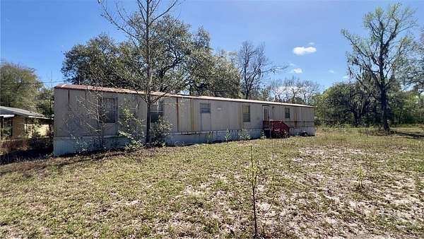 3 Acres of Land with Home for Sale in Bloomingdale, Georgia