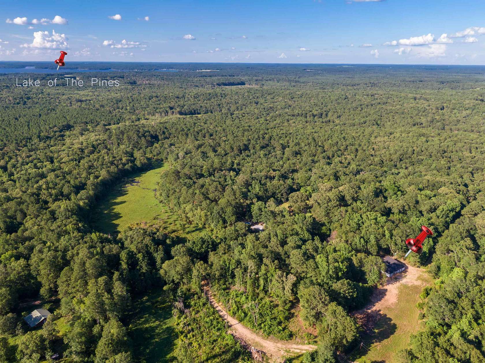 9.58 Acres of Land with Home for Sale in Harleton, Texas