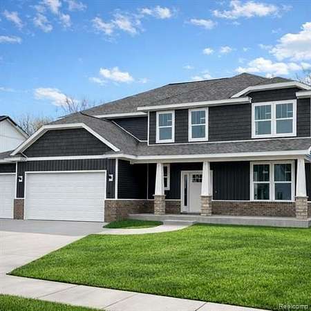 Land with Home for Sale in Marion Township, Michigan