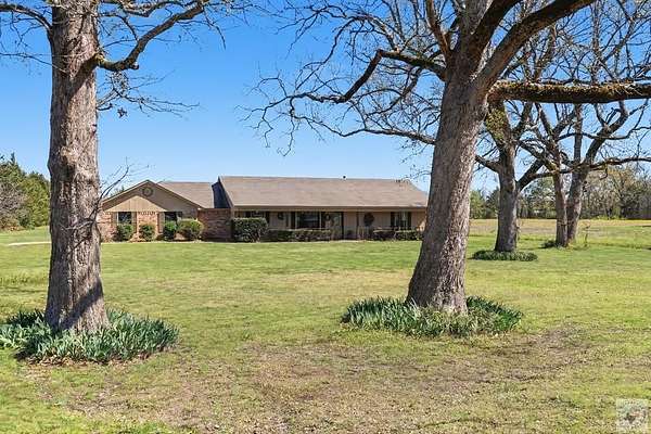 15 Acres of Land with Home for Sale in De Kalb, Texas