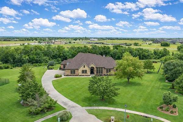 1.84 Acres of Land with Home for Sale in McLendon-Chisholm, Texas