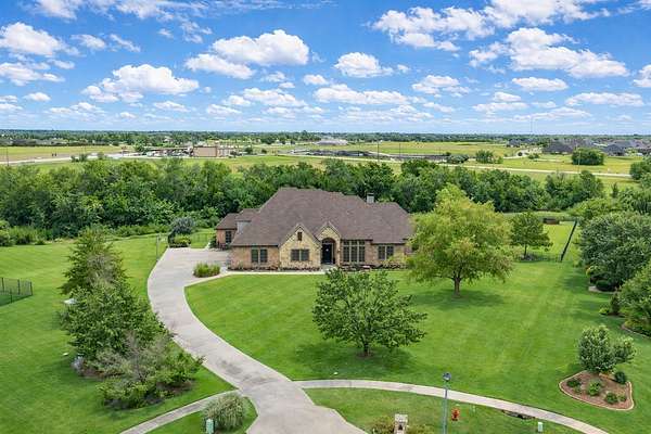 1.84 Acres of Land with Home for Sale in McLendon-Chisholm, Texas
