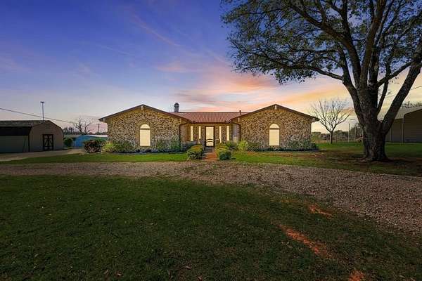 1.74 Acres of Land with Home for Sale in Keene, Texas