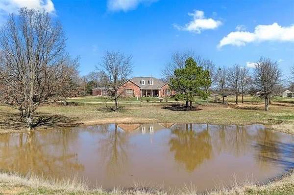 5.54 Acres of Land with Home for Sale in Mannsville, Oklahoma