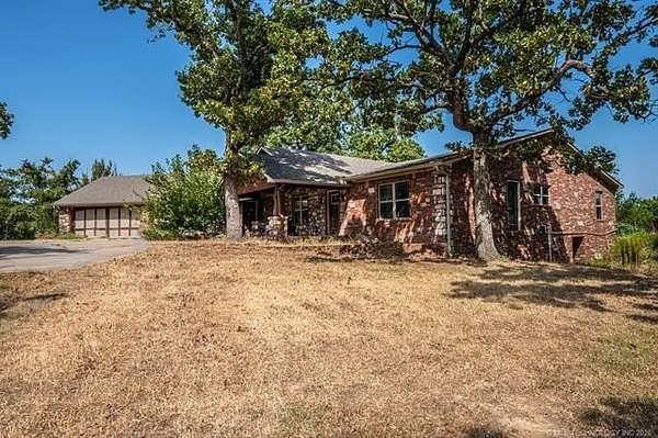 23.4 Acres of Agricultural Land with Home for Sale in Spiro, Oklahoma