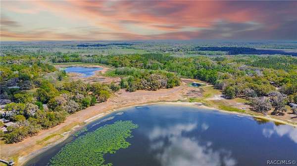 4.7 Acres of Land with Home for Sale in Floral City, Florida