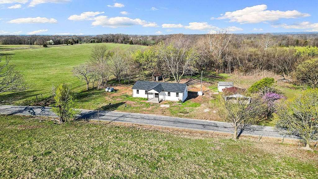 13.9 Acres of Land with Home for Sale in Anderson, Missouri