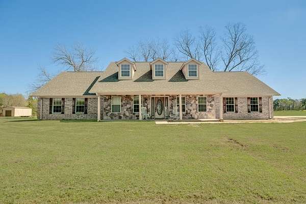 54 Acres of Land with Home for Sale in Elkhart, Texas